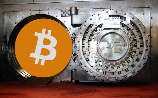 An open bank vault, with a bitcoin symbol within the vault